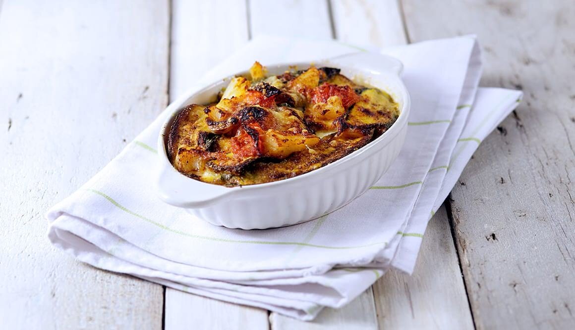 Parmigiana aus Zucchini und Stockfisch