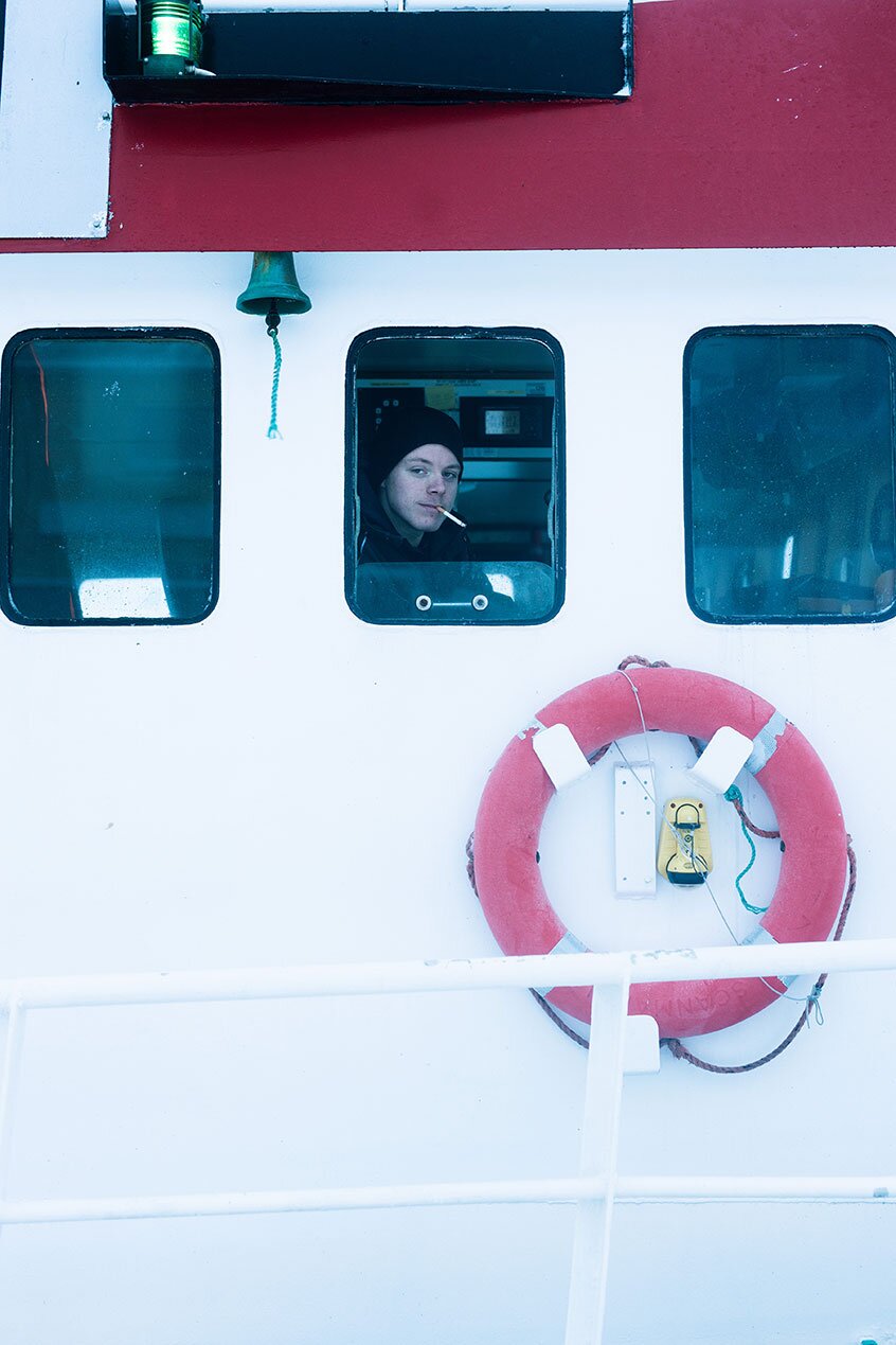 Fischer im Steuerhaus